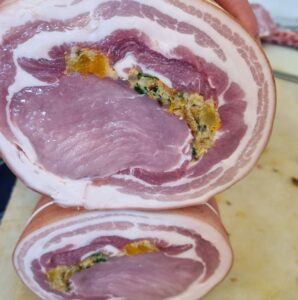 Rolled loin of pork with apricot and macadamia seasoning